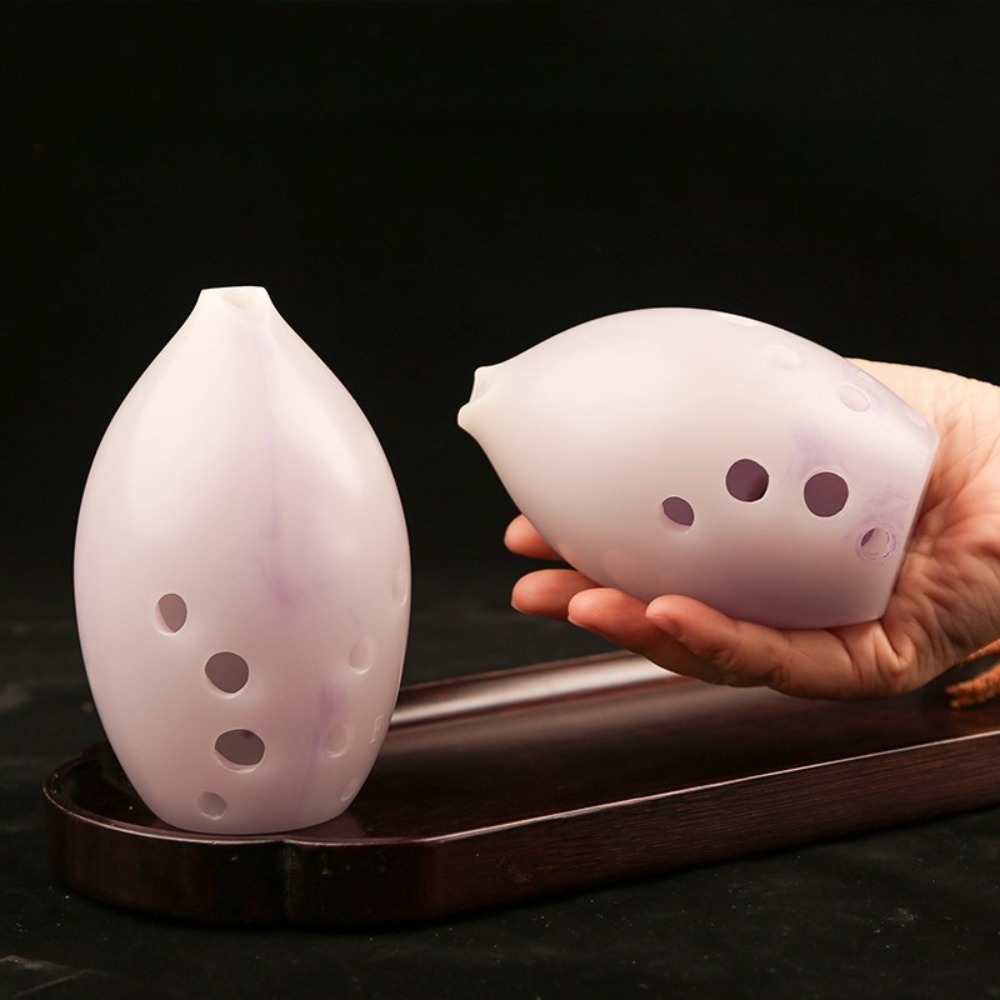 Musical Instrument Xun - 10 fori in resina a forma